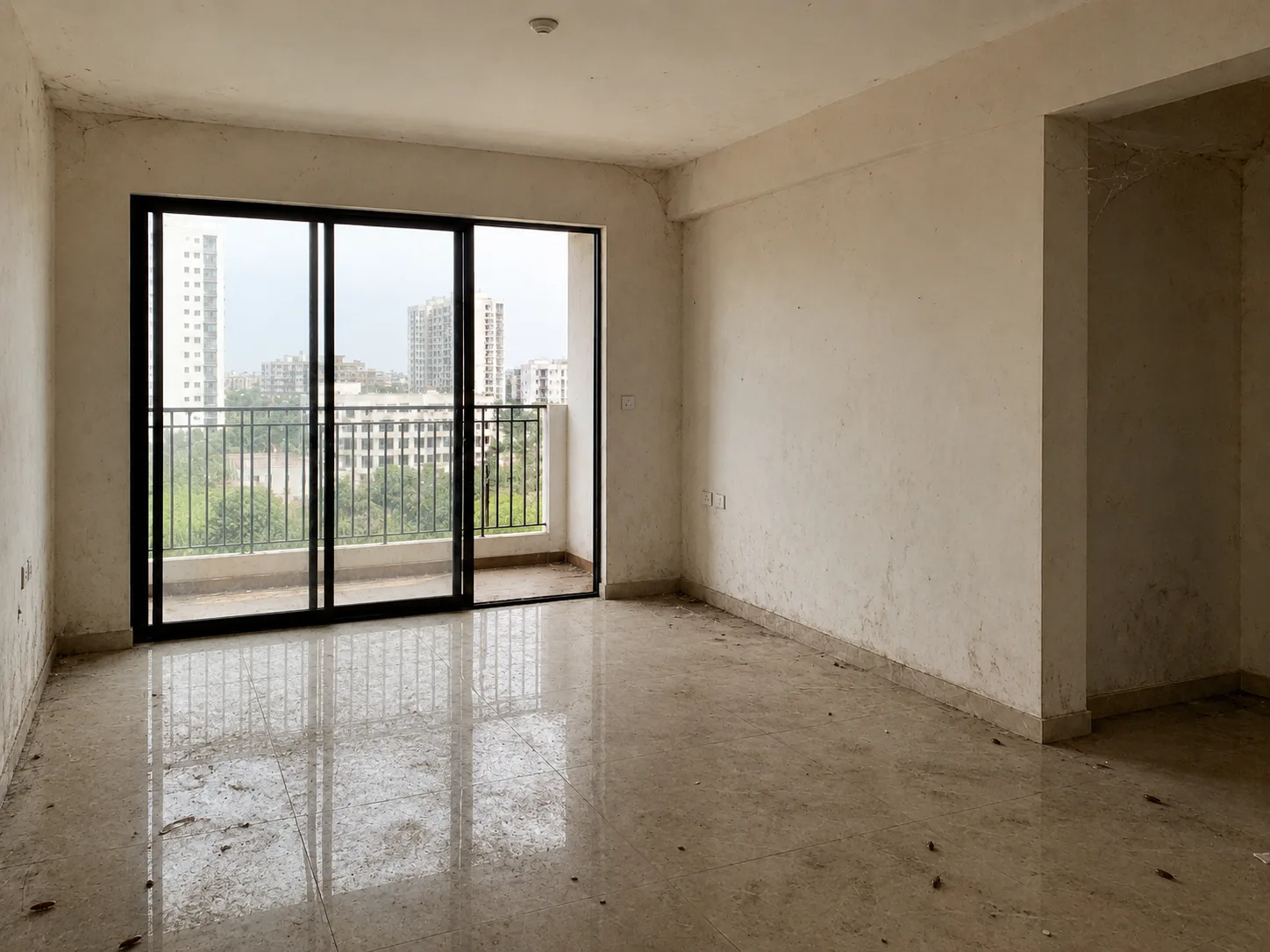 An empty apartment in Bengaluru being deep cleaned before move-in